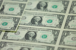 الدولار يستقر مع تراجع توقعات رفع الفائدة