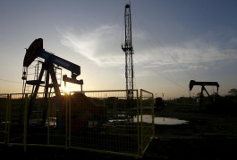 Oil up 2 percent as dollar softens; Brent in for big weekly loss