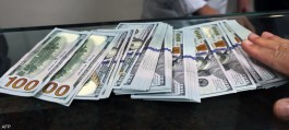 Strong dollar dims gold's shine