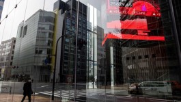 Asian shares mixed ahead of US data, Bitcoin rally
