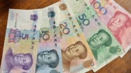 China cuts medium-term loan rates, yuan soars to 16-month high