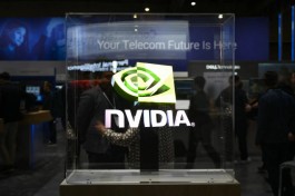 Nvidia shares gain $73 billion in one day... and earnings forecasts send AT&T shares soaring