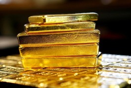 Gold dips as markets await more cues on US interest rate path