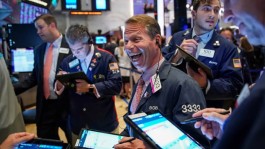 The S&P 500 index climbs, nearing its all-time high.
