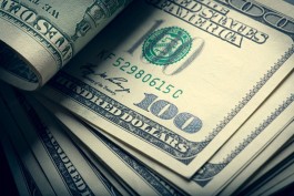 US bond yields fall as the public awaits the Fed's decision and oil tensions escalate.