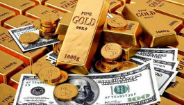 تباين سعر الذهب والدولار بعد رفع سعر الفائدة الأمريكية