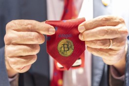 Bitcoin hits record high, surpasses $75,000