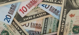 Dollar holds gains, yen falls as rate cut bets ease